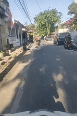Scooter ride leads to a lively Surabaya basketball court