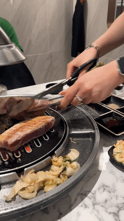 Korean barbecue dining captured in Seogwipo-si restaurant