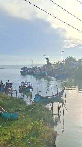Keude harbor and river bridge in quiet daylight