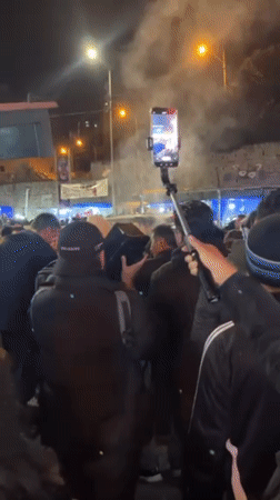 Nighttime street market draws crowds in La Paz, Bolivia