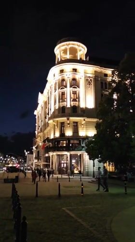 Nighttime architectural tour documented in central Warsaw, Poland