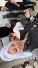 Tourist records selfie video in crowded Budva street scene