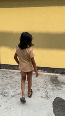 Morning rooftop scenes capture children playing in Dhaka