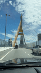 Vehicle crosses suspension bridge in Thailand early morning
