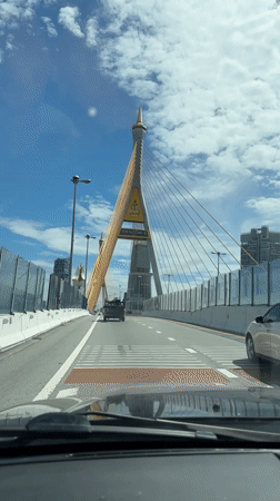 Vehicle crosses suspension bridge in Thailand early morning
