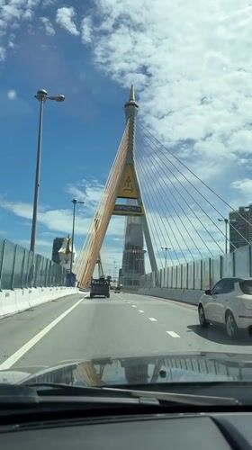 Vehicle crosses suspension bridge in Thailand early morning