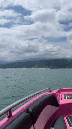 Pink speedboat spotted on waters near Chirkey, Russia
