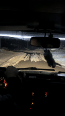 Driver navigates snowy roads in Mozhga, Russia