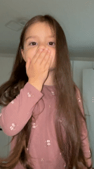 Girl records indoor moments with hair product in Sandanski