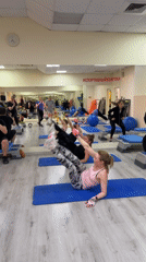 Group fitness class with exercise balls held in Izhevsk gym