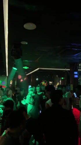 Crowded bar scene captured in Liangjiang entertainment district