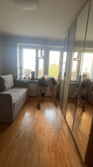 Woman exercises in Saint Petersburg apartment during afternoon session