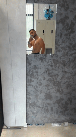 Man Takes Shirtless Selfie in Gabrovo Locker Room Mirror