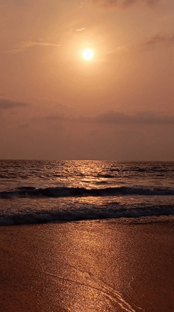 Sunset documented at Querim beach, India with coastal scenes