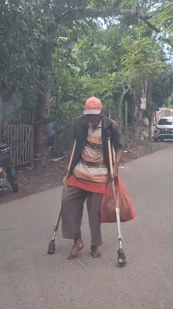 Early morning street life and digital messages in Lhokseumawe