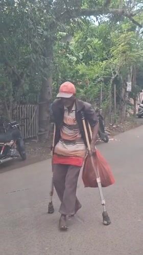 Early morning street life and digital messages in Lhokseumawe