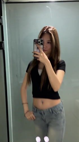 Woman Takes Bathroom Mirror Selfies in Yuzhong District