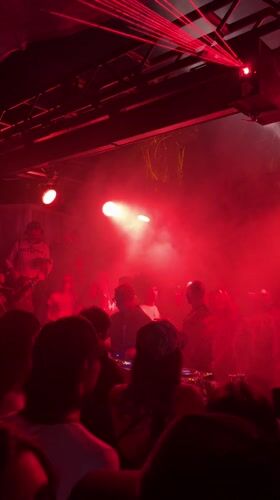 DJ performs at smoke-filled club in La Quinta