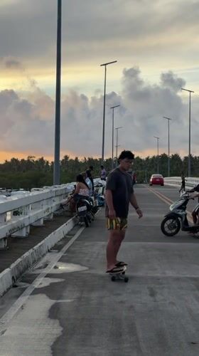 Bridge becomes recreational hub during sunset in General Luna