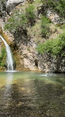 Waterfall barbecue gathering captured in Boreti, Montenegro