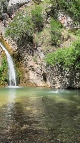 Waterfall barbecue gathering captured in Boreti, Montenegro