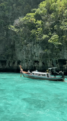 Boat tour through Ao Nang's limestone cliffs and turquoise waters