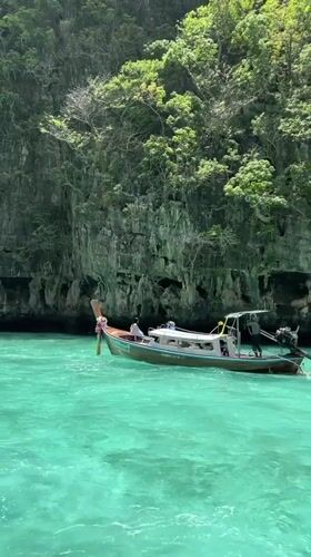 Boat tour through Ao Nang's limestone cliffs and turquoise waters