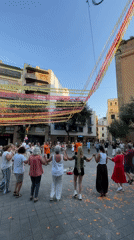 Circle dancing and live music fill Arenys de Mar's festival square