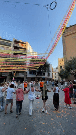 Circle dancing and live music fill Arenys de Mar's festival square