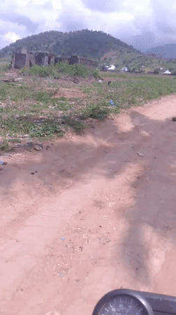 Motorcycle tour through Serti's streets, shops, and outskirts