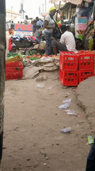 Market vendors sell fresh produce in Sabon Tasha