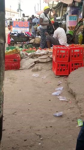 Market vendors sell fresh produce in Sabon Tasha