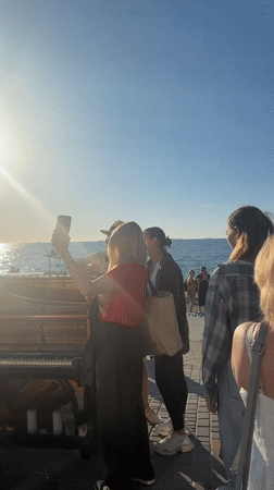 Sunny afternoon on Odesa's waterfront promenade, piano and all