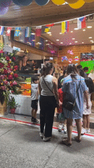 Evening celebration with balloons and gatherings around Vancouver shops