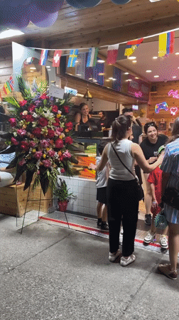 Evening celebration with balloons and gatherings around Vancouver shops