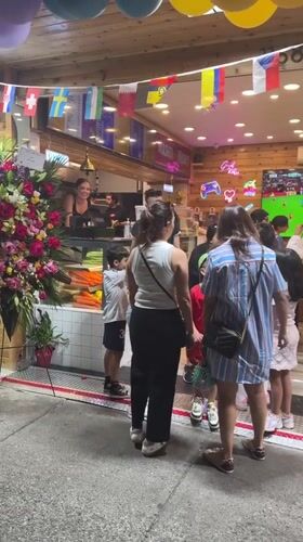 Evening celebration with balloons and gatherings around Vancouver shops