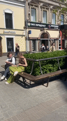 Ordinary street life documented in central Kazan on sunny morning