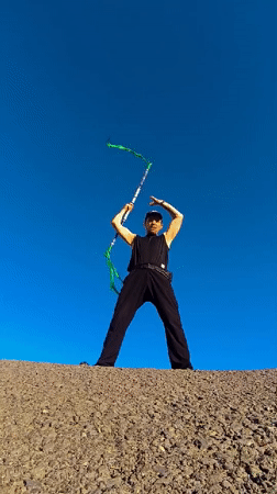 Staff and nunchaku practice on a sunny day in Karaganda