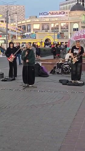 Live music and costumed figures at a Kazan outdoor gathering