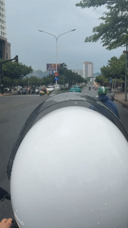 Morning motorcycle commute captured on helmet cameras in Nha Trang