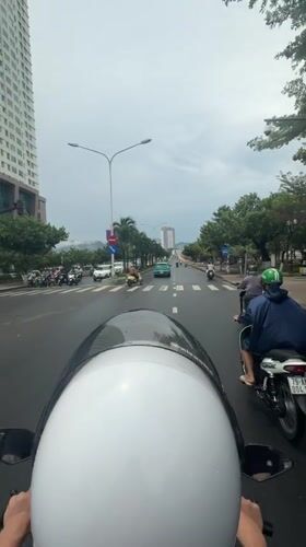 Morning motorcycle commute captured on helmet cameras in Nha Trang