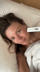 Woman with thermometer documented in North Kuta bedroom