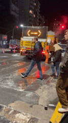 Routine nighttime street activity and selfie documented in Buenos Aires
