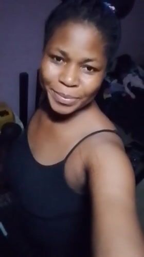 A quiet night out in Yenagoa, energy drink in hand.