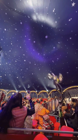 Motorcycle stunt show performed in star-decorated circus tent in Gabrovo