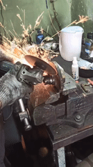 Workshop Worker Operates Angle Grinder in Safety Gear