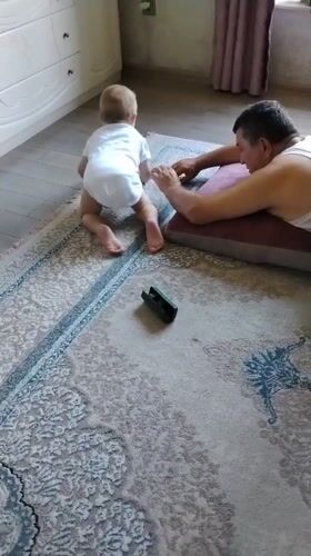 Quiet floor time with a baby on a rug in Baku