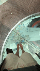 Visitor documents decorative glass floors and displays at Izhevsk mall