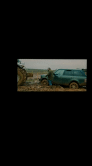 Range Rover stuck in mud in London countryside