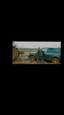 Range Rover stuck in mud in London countryside